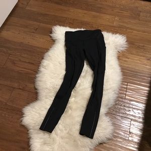Black leggings with reflective stripe and pockets